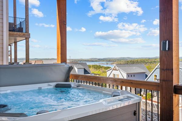 Wellness porch. 7-person Hot Springs Hot Tub overlooking our quiet cove on Table Rock Lake.