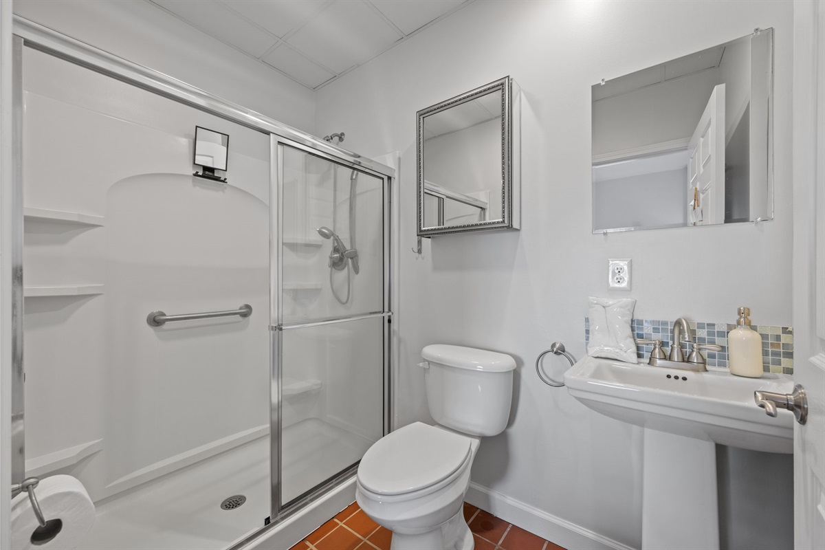 Master bathroom with walk in shower and an en suite layout