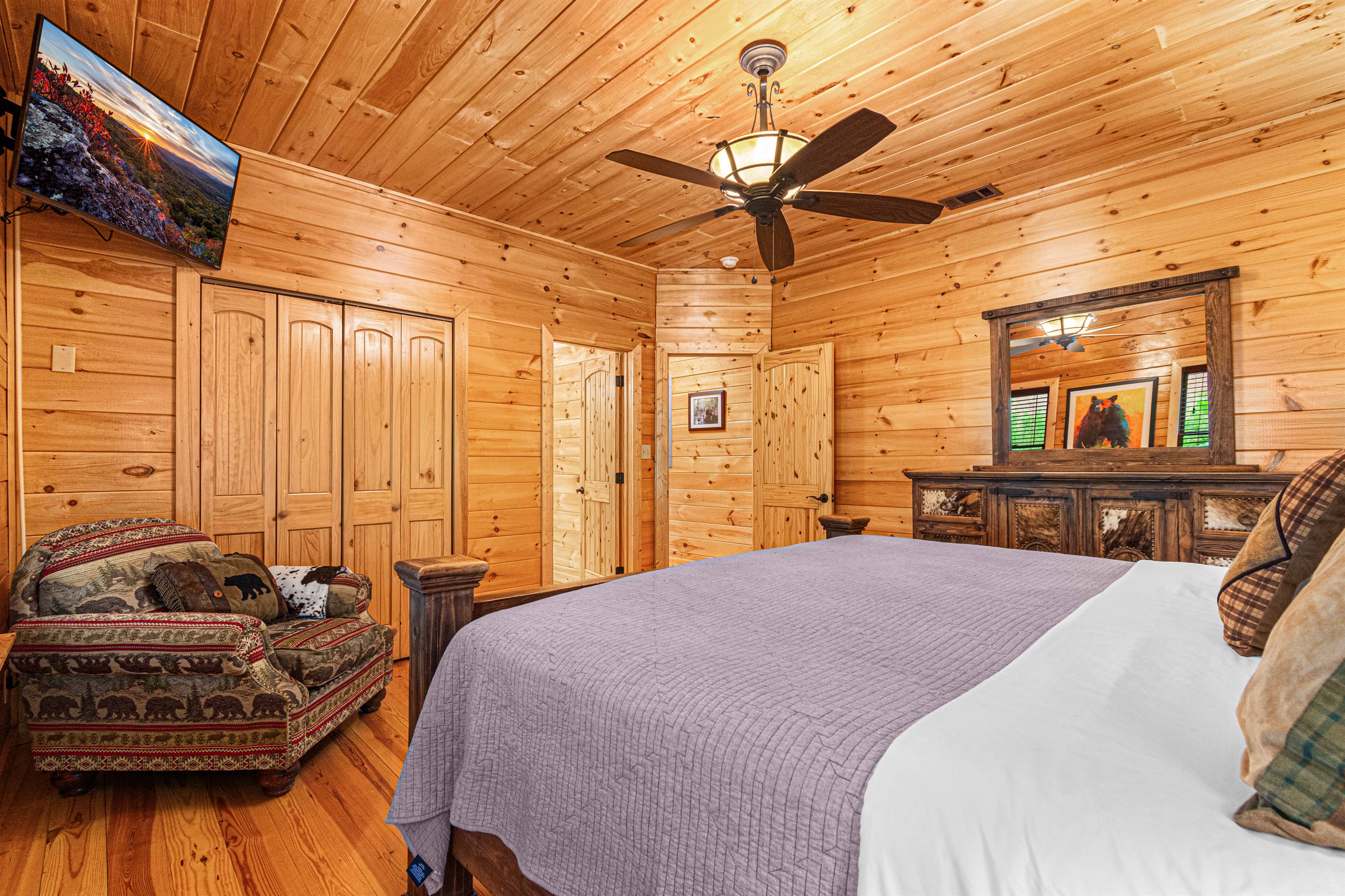 Mountain Dreams: Unwind in this cozy and inviting bedroom after a day of adventure.