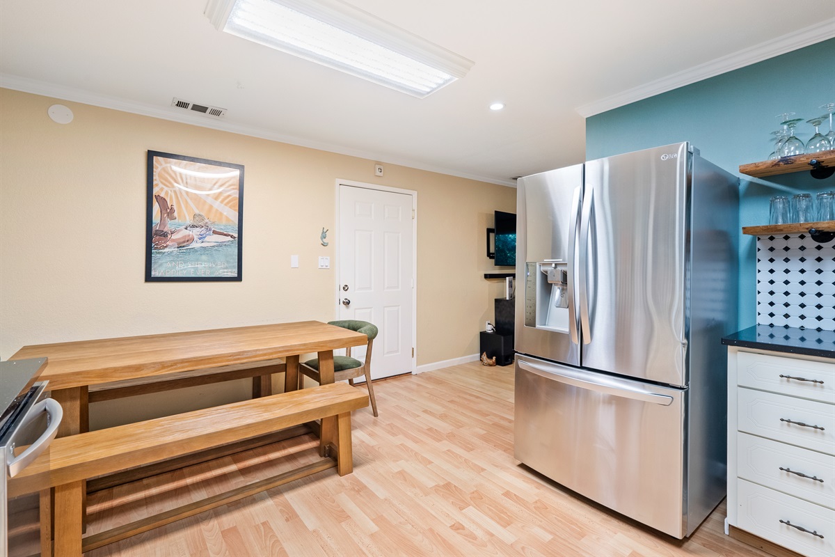 Modern amenities and a large harvest table make this space feel like home.