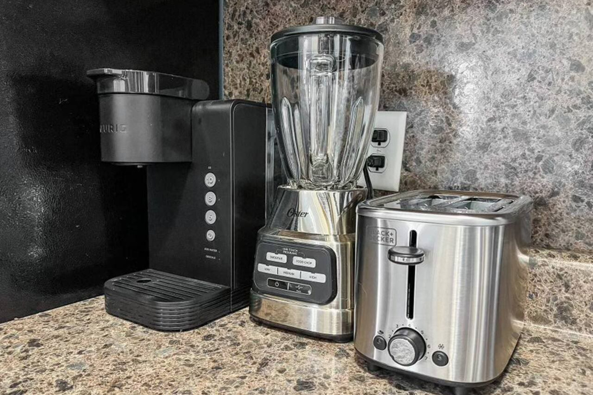 Keurig coffee maker, blender, and toaster, offering everything you need for a quick breakfast or a fresh cup of coffee.