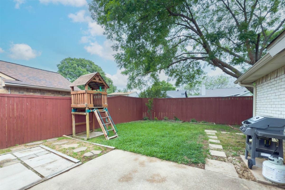 Backyard playset for kids to enjoy outdoor fun.