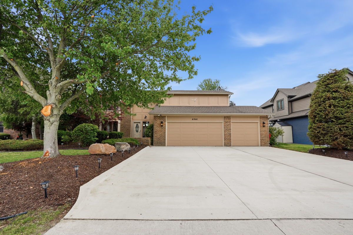 xx Gracing the heart of a meticulously maintained, lush landscape, this striking single-family residence commands attention with its clean, contemporary aesthetic and thoughtfully curated exterior details.