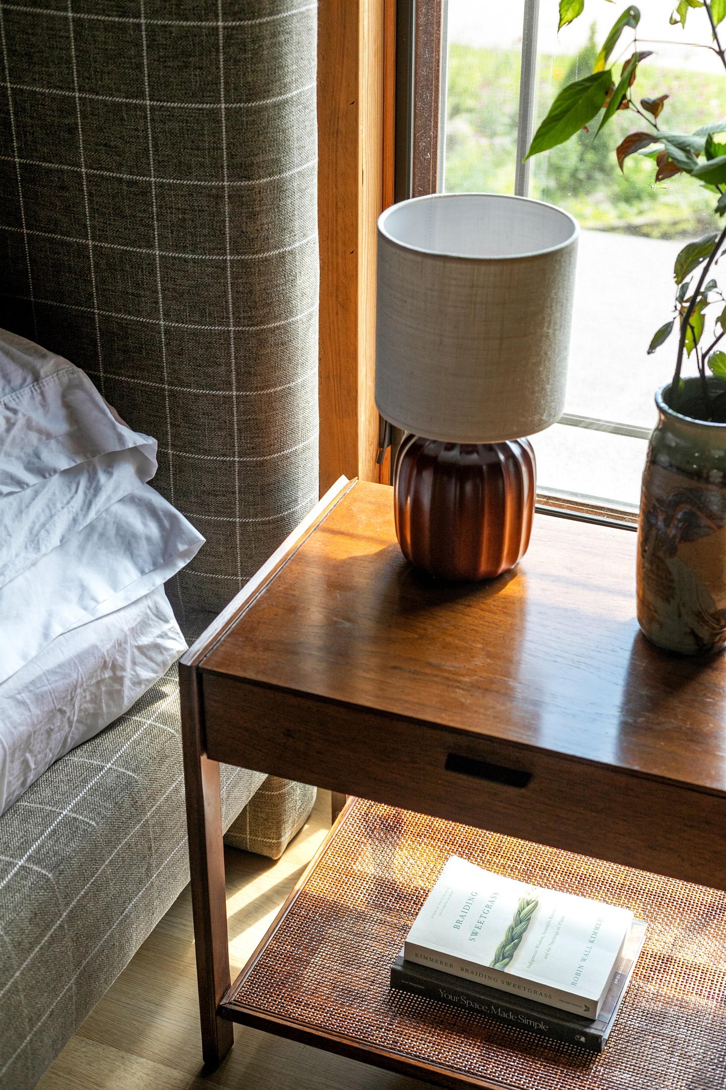 Bedside lamps cast a gentle glow, creating a cozy ambiance while keeping nighttime lighting within easy reach.