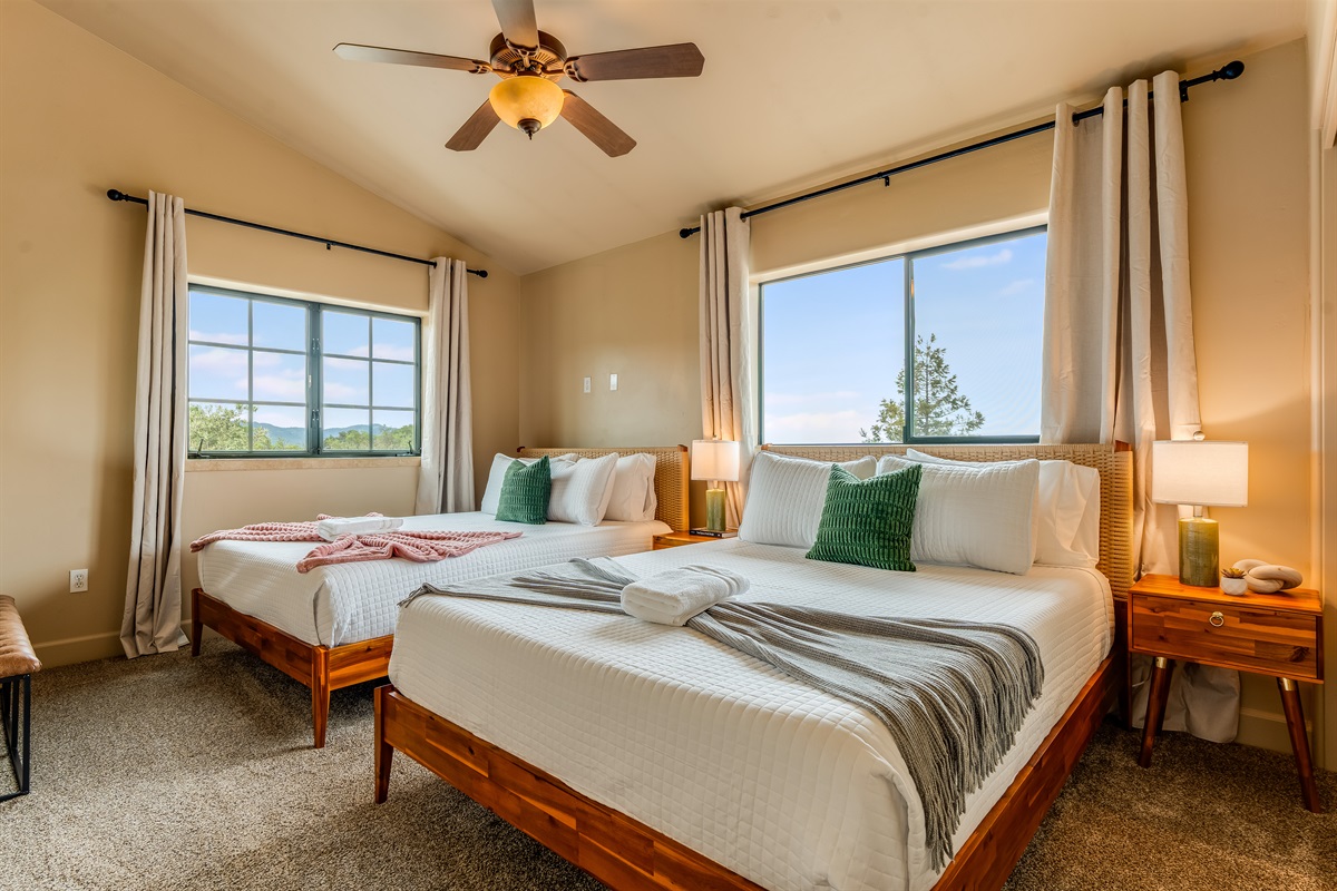 Upstairs Bedroom 2 with two Queen sized beds