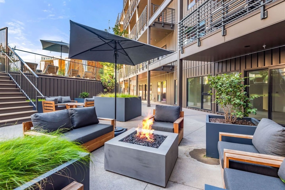 Fire Pit!! Lower pool deck patio area - tons of seating - public area in the building and guests are encouraged to use during their stay with us!