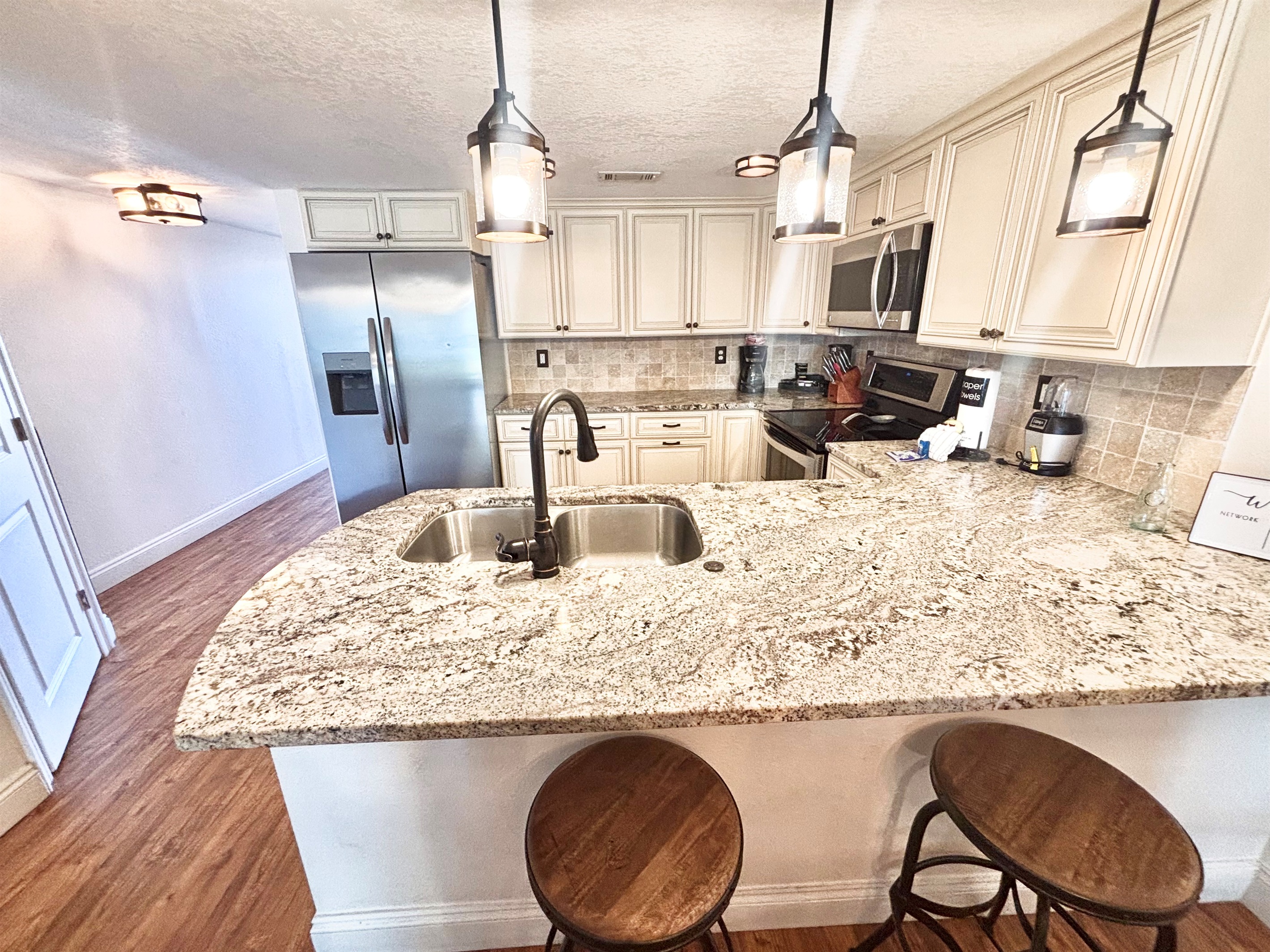Bar seating available at kitchen counter