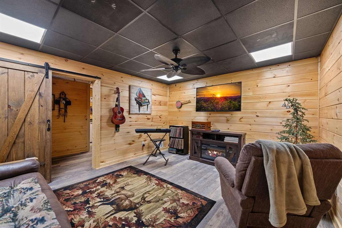 A music lounge located in the basement provides a private and comfortable space to relax and unwind