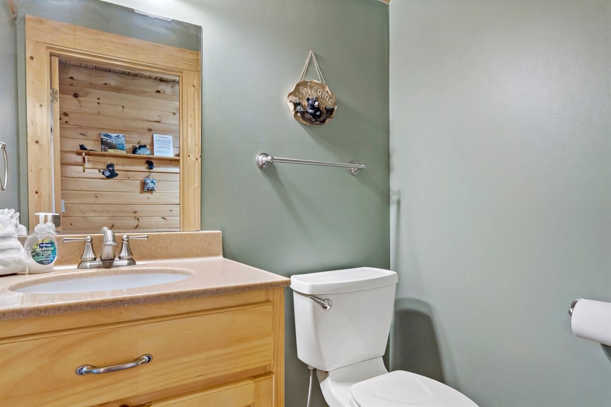 Half bath on main level of the cabin