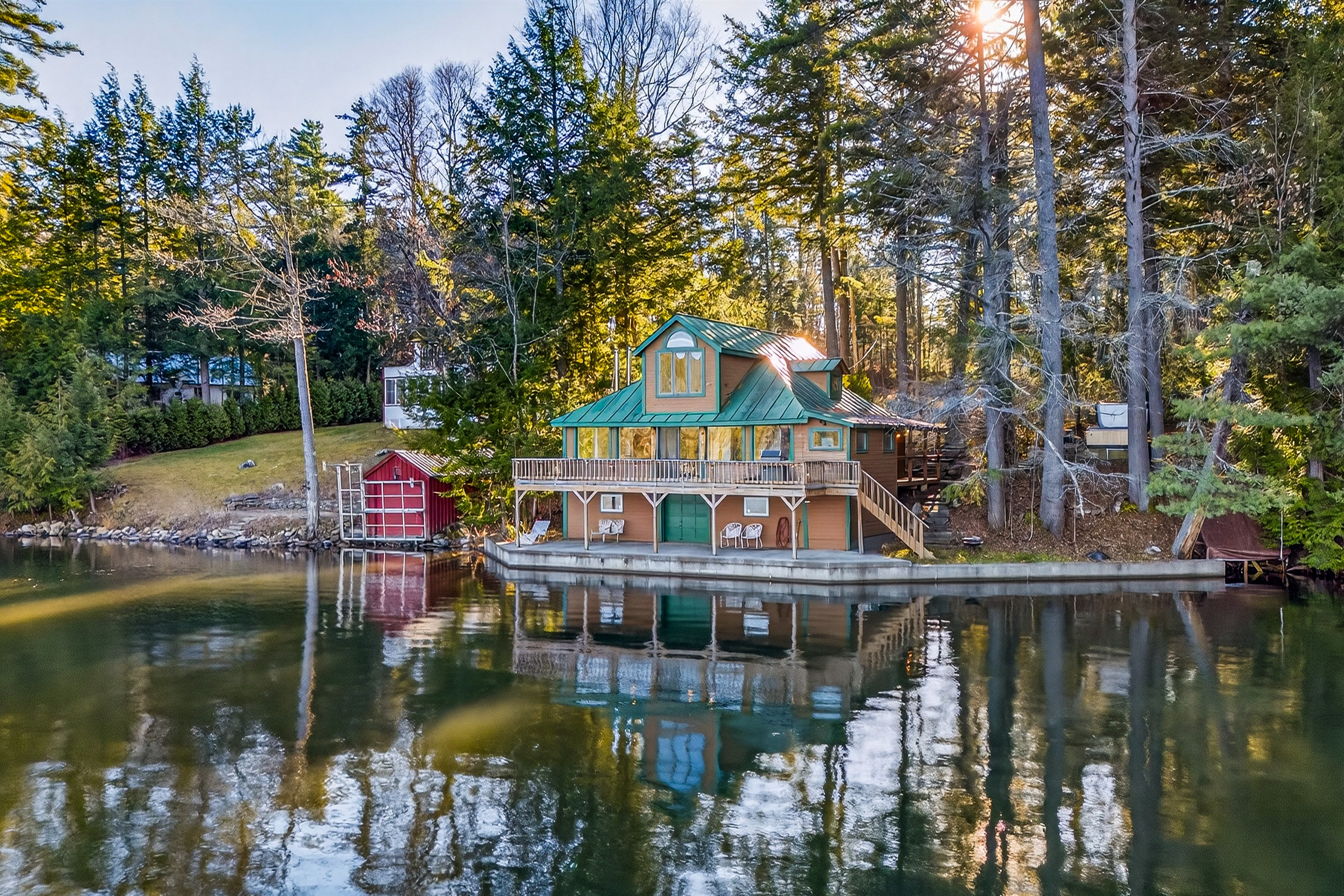 The cabin tucked right on the lake with private dock access.