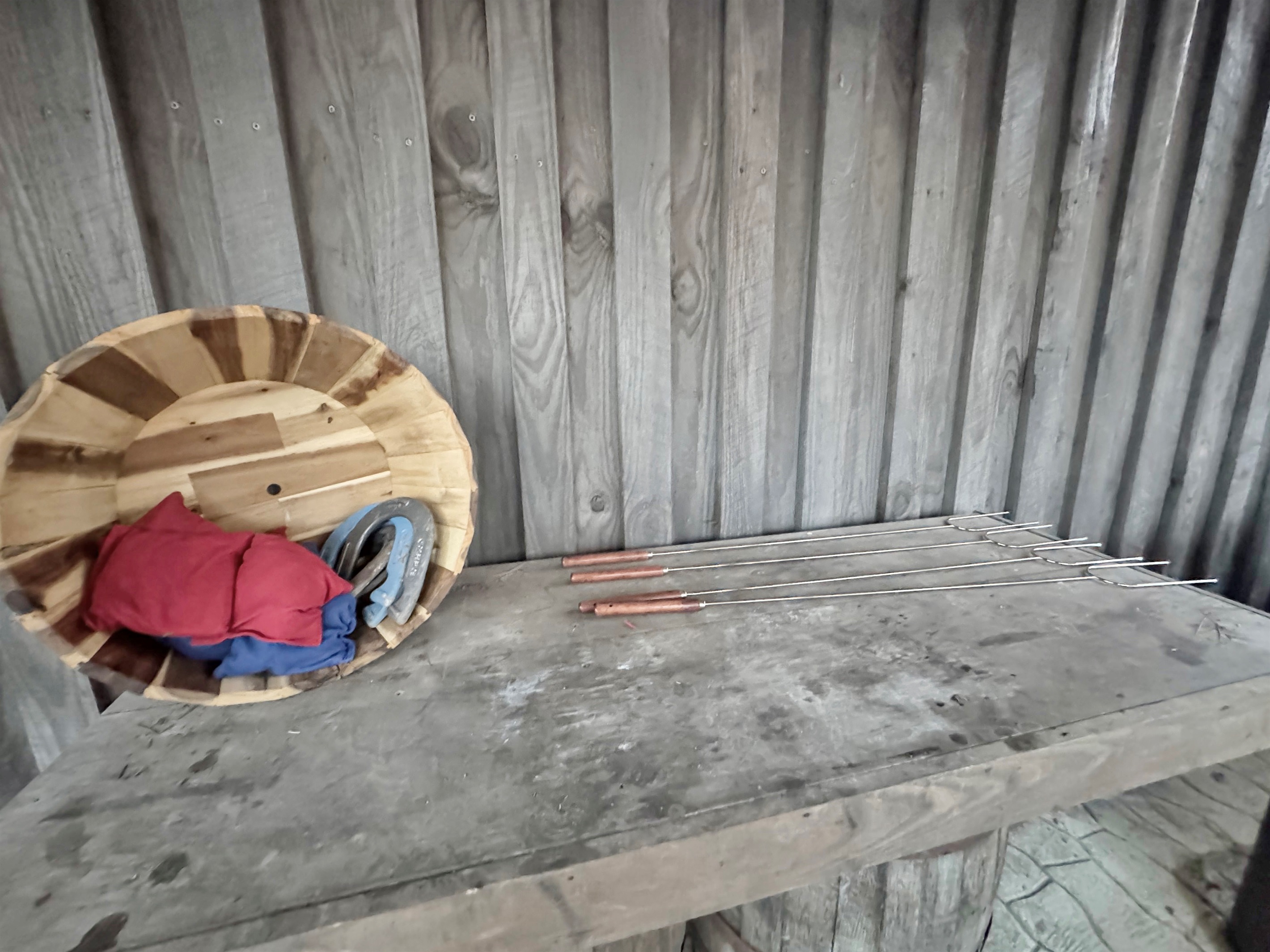 Cornhole bags, horsehoes, and marshmallow roasting sticks.