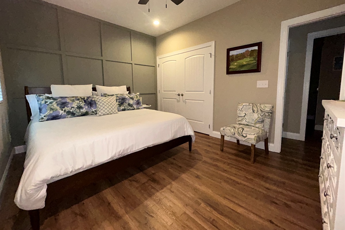 Primary bedroom with king sized bed