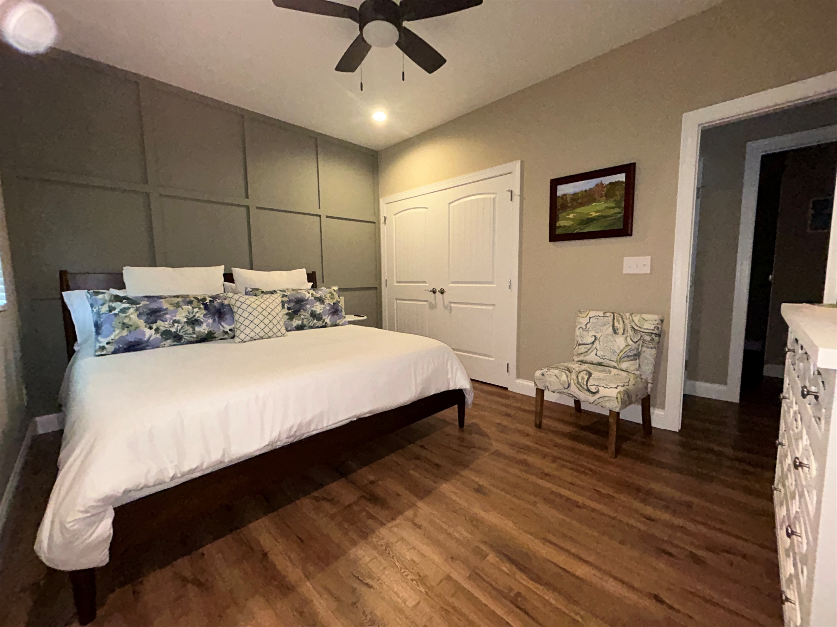Primary bedroom with king sized bed