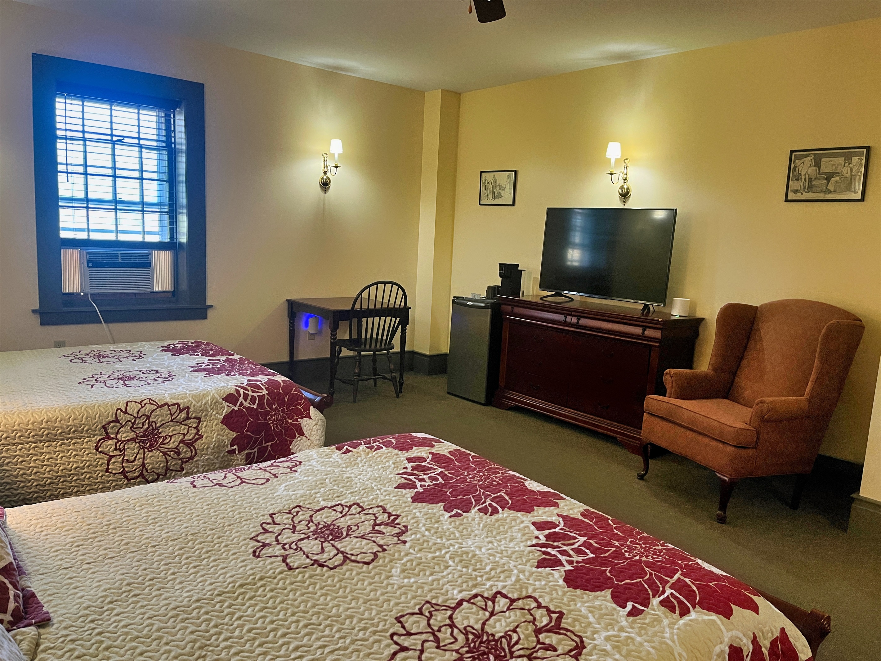 Guest room #5 with Roku TV and mini fridge.