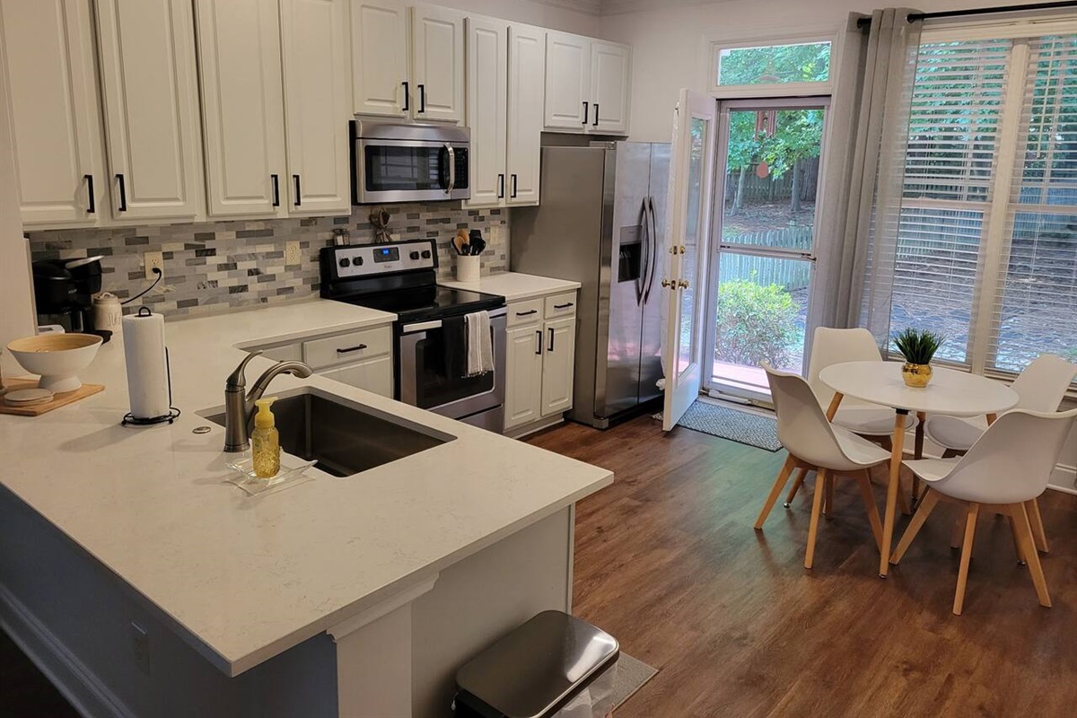 Very well stocked kitchen should have everything you need for cooking meals. Also a small table for morning coffee, eating, etc.