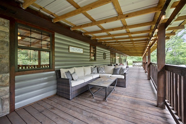 Large covered front porch offers 3 areas to sit and relax.