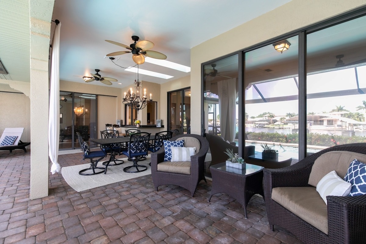 Dining and lounging areas on the lanai with water views