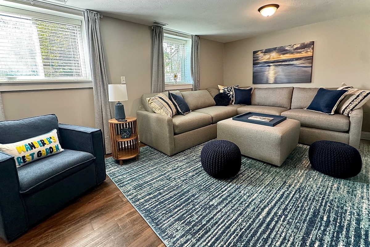 The Garden Level Living Room has plenty of seating and Queen sofa bed.
