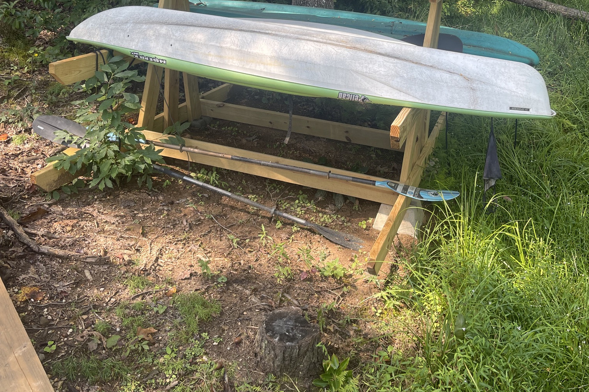 A canoe and two kayaks for guest your enjoyment.