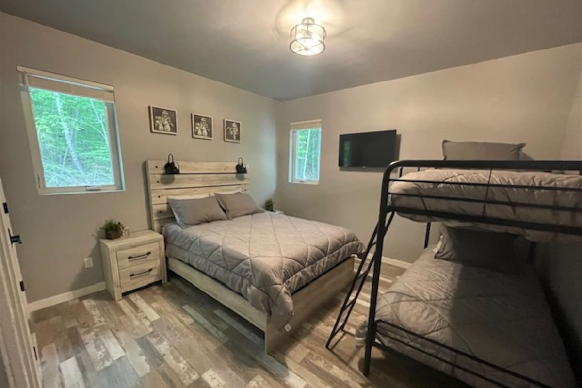 House #2 - Bedroom #3 - 1 queen bed, twin bunk bed, tv, and full bathroom
