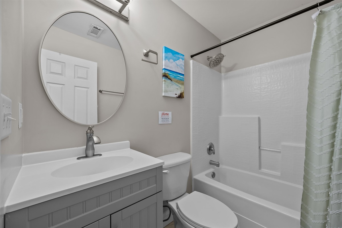 Full bath with shower-tub combo designed for comfort and convenience
