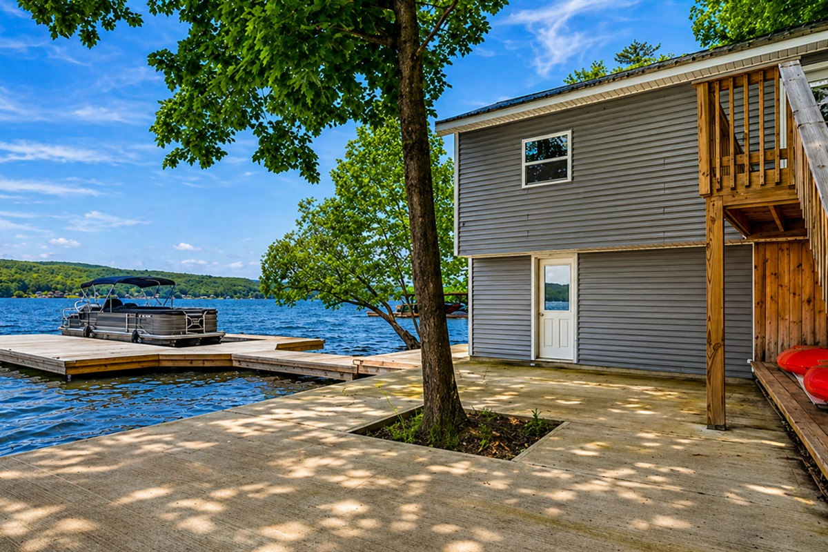 Private dock with stunning water views—perfect for swimming, boating, or soaking in serene Finger Lakes sunsets. 🌅🚤🌿