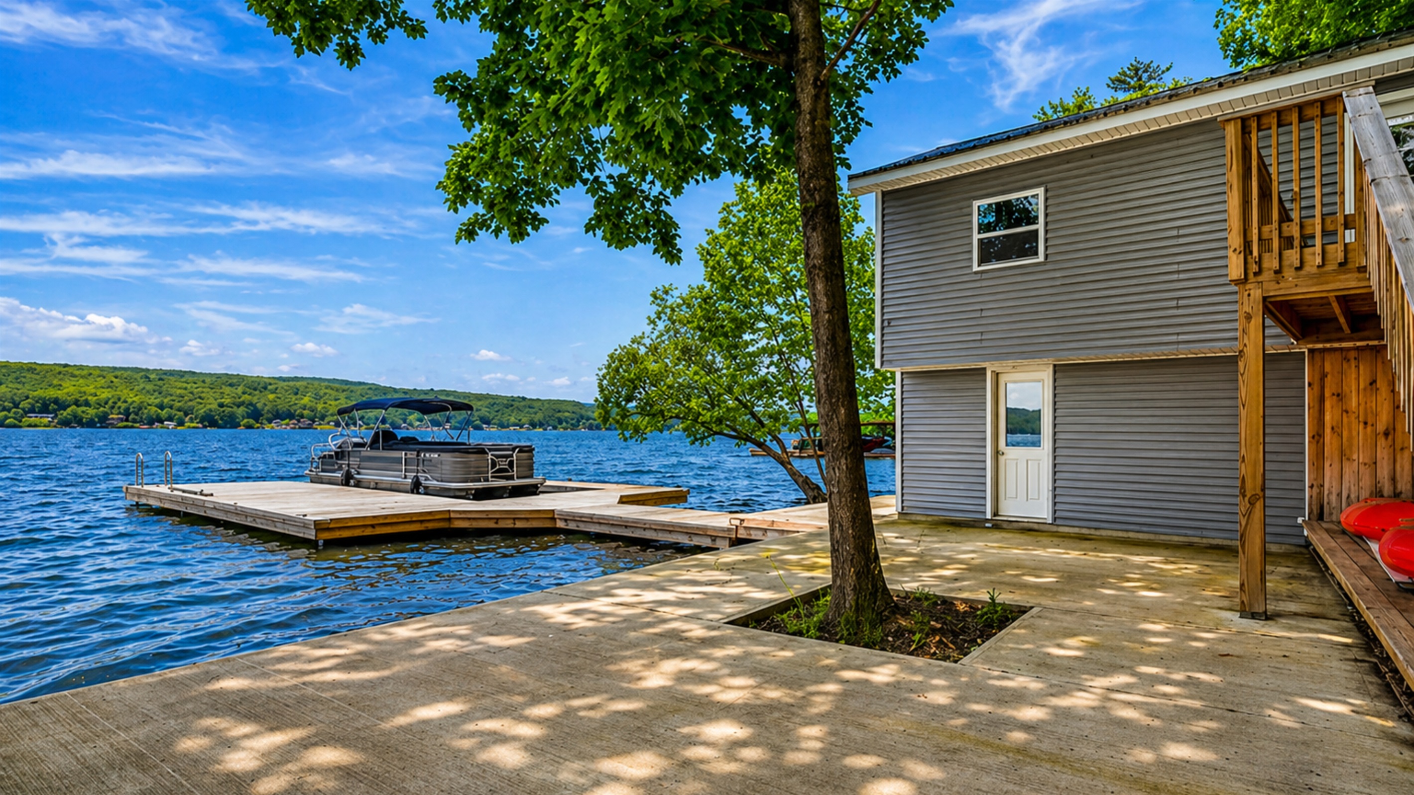 Private dock with stunning water views—perfect for swimming, boating, or soaking in serene Finger Lakes sunsets. 🌅🚤🌿