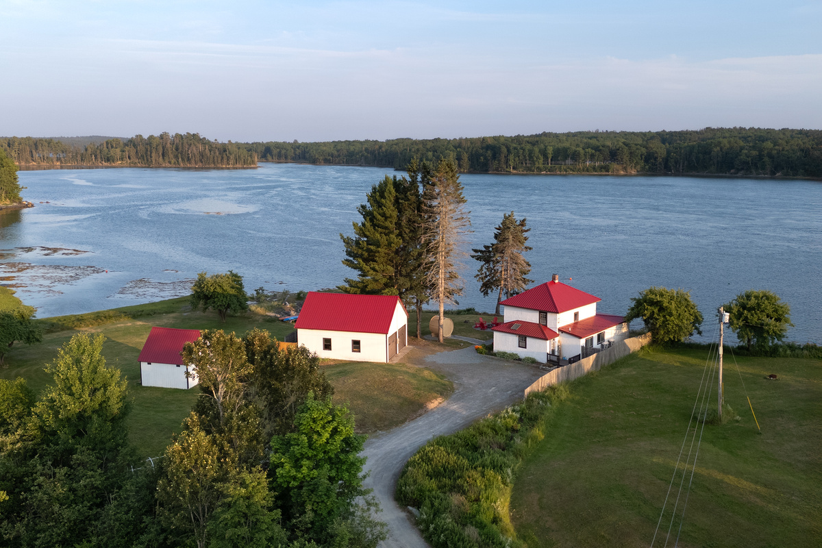 Wander down to the beach with no plan and find your own corner of the cove — the shoreline is yours from the far tree line to the fence - 400 feet of shoreline