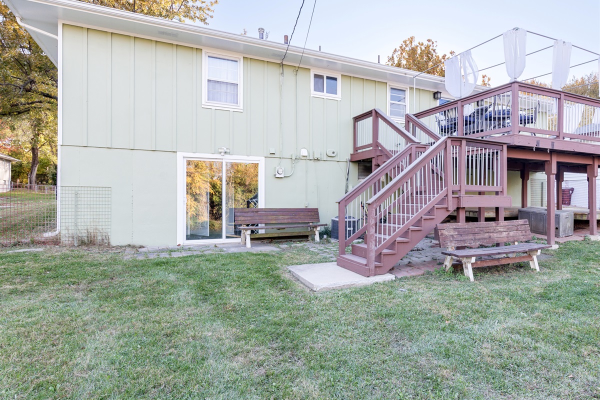 Rear exterior of the home with direct access to the yard and outdoor areas.