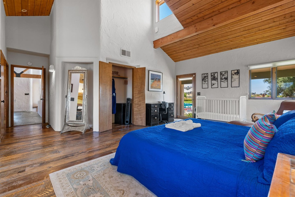 Master bedroom, own entry to the pool.  Your private retreat after a day in the sun.  Hotel-style comfort with the privacy of home.  Sleep easy in serene surroundings.
