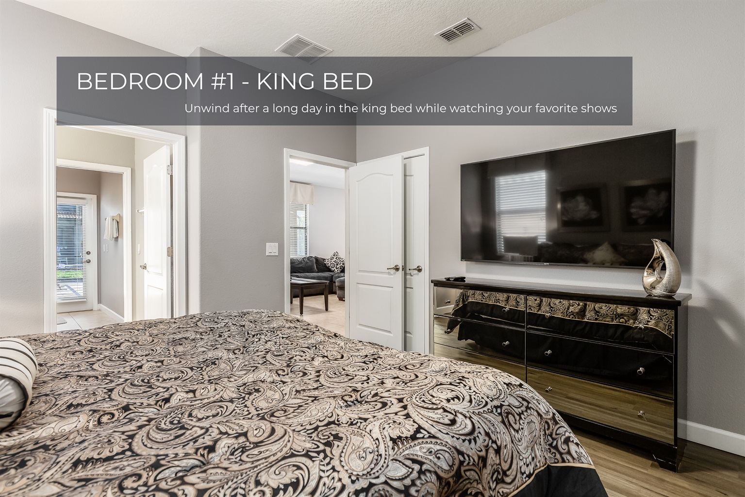 Spacious king bed with soft linens and a peaceful vibe—your perfect bedroom retreat