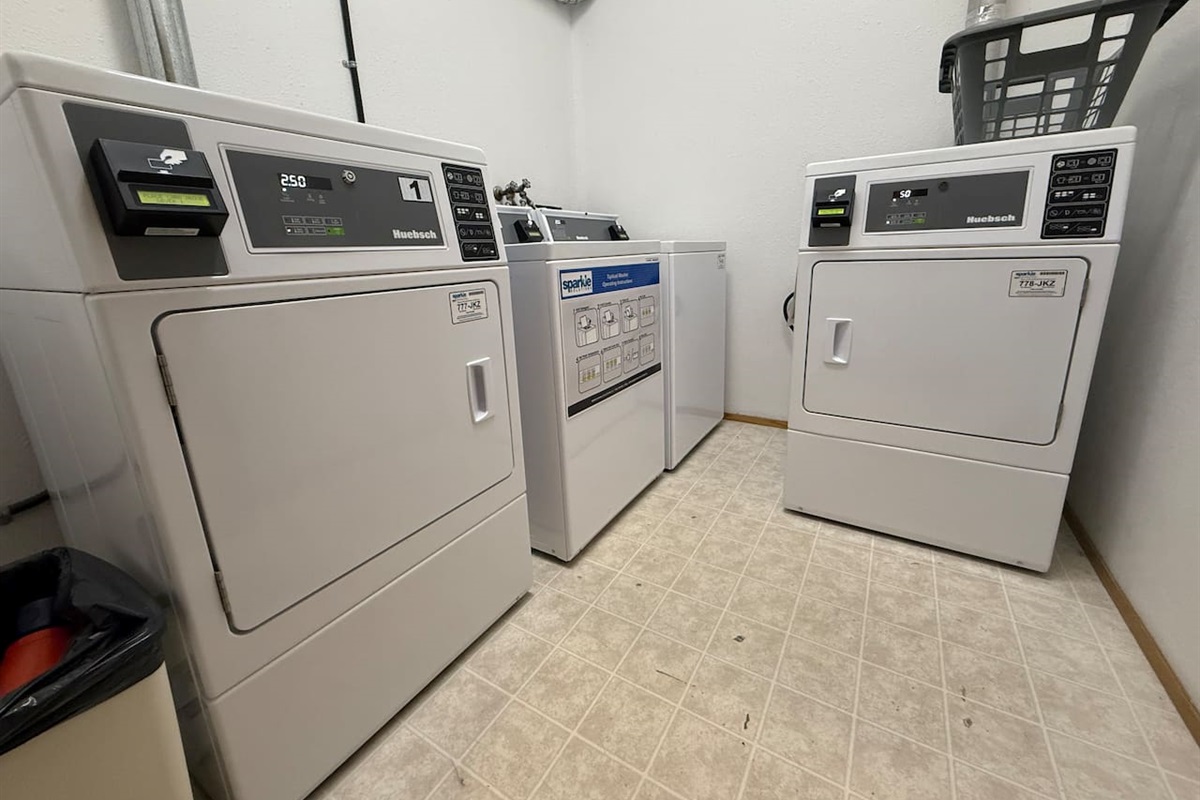 Full service washer and dryer. We provide a sparkle card to use these machines. We leave it charged with money but if it runs out before we get back, we will reimburse up to $10 so you can do two full loads.