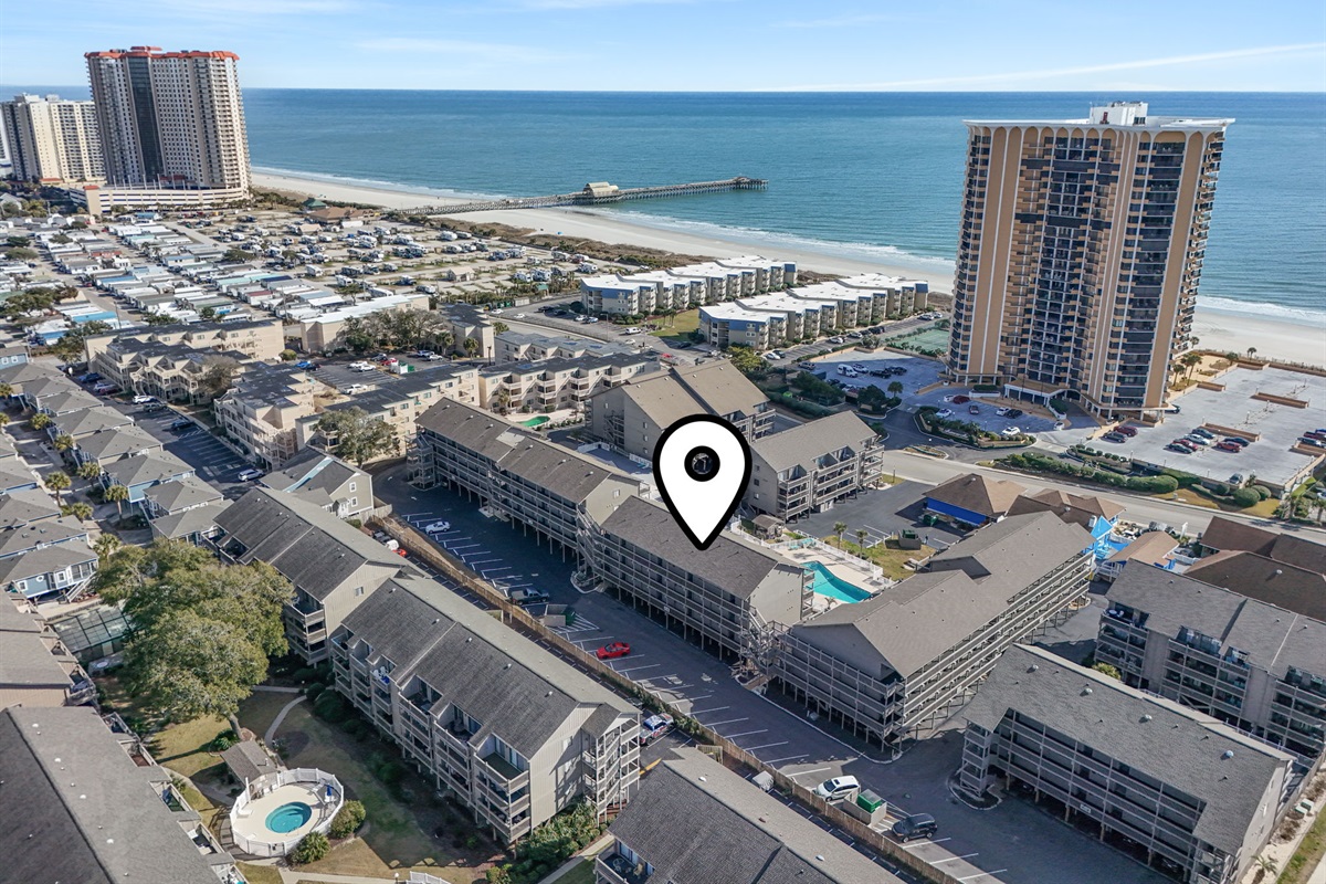 Oceanview condo overlooking multiple pools, walk to the Apache Pier, Resturaunts and so much more! 