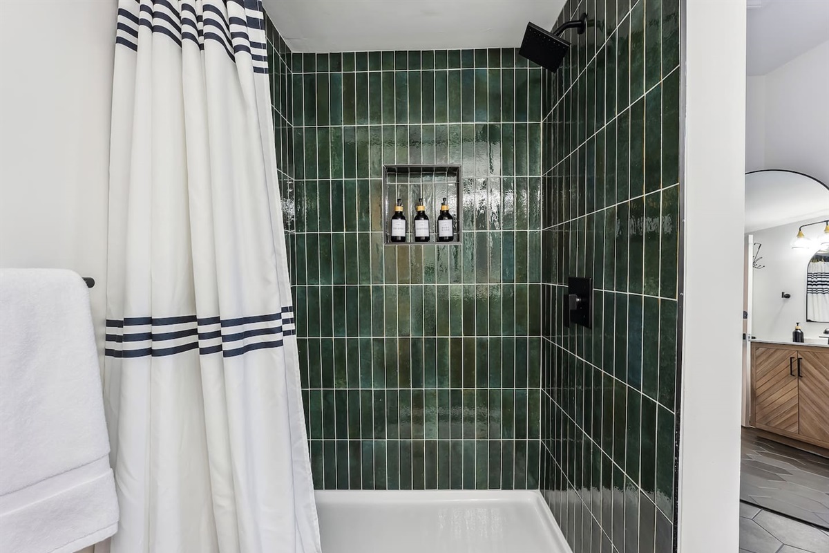 Beautiful tile shower that you must see to appreciate!  Complimentary shampoo, conditioner and body wash are provided for you.