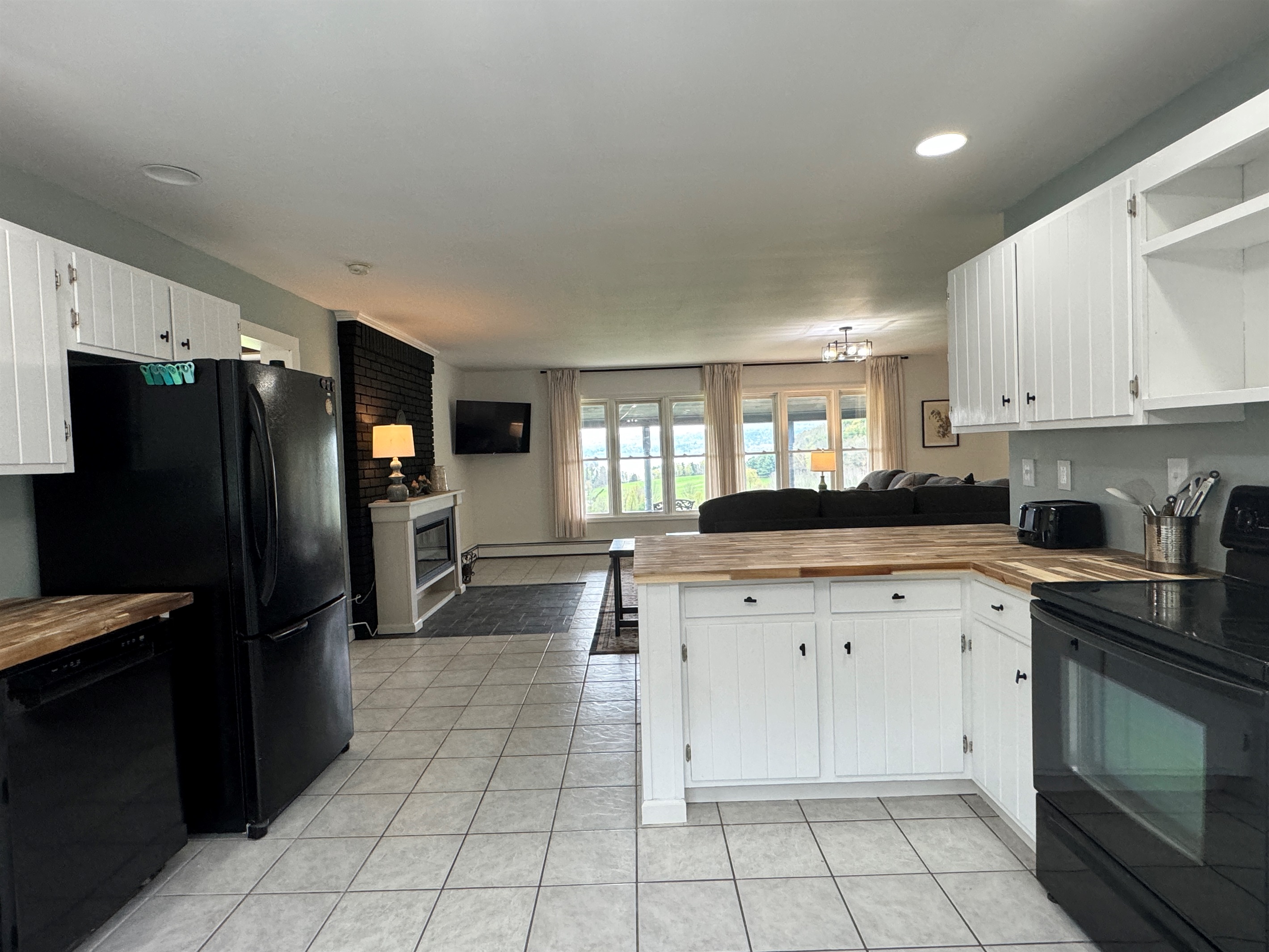 Kitchen with living room beyond