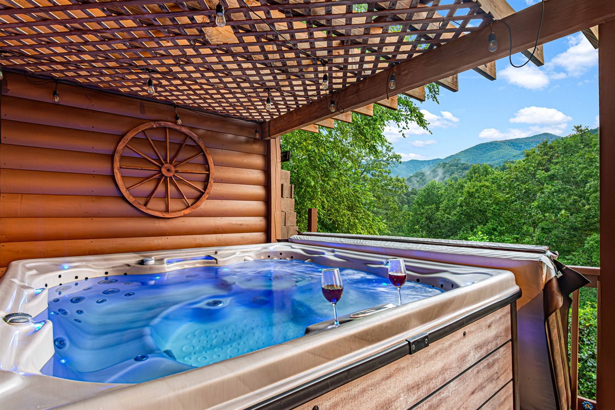 Hot tub heaven: Imagine yourself relaxing in this hot tub, sipping wine, and enjoying the peace and quiet of the mountains.
