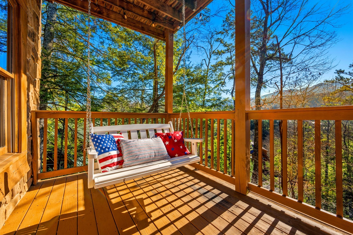 Sip your favorite beverage while swinging on the bench and enjoying the fresh mountain air.