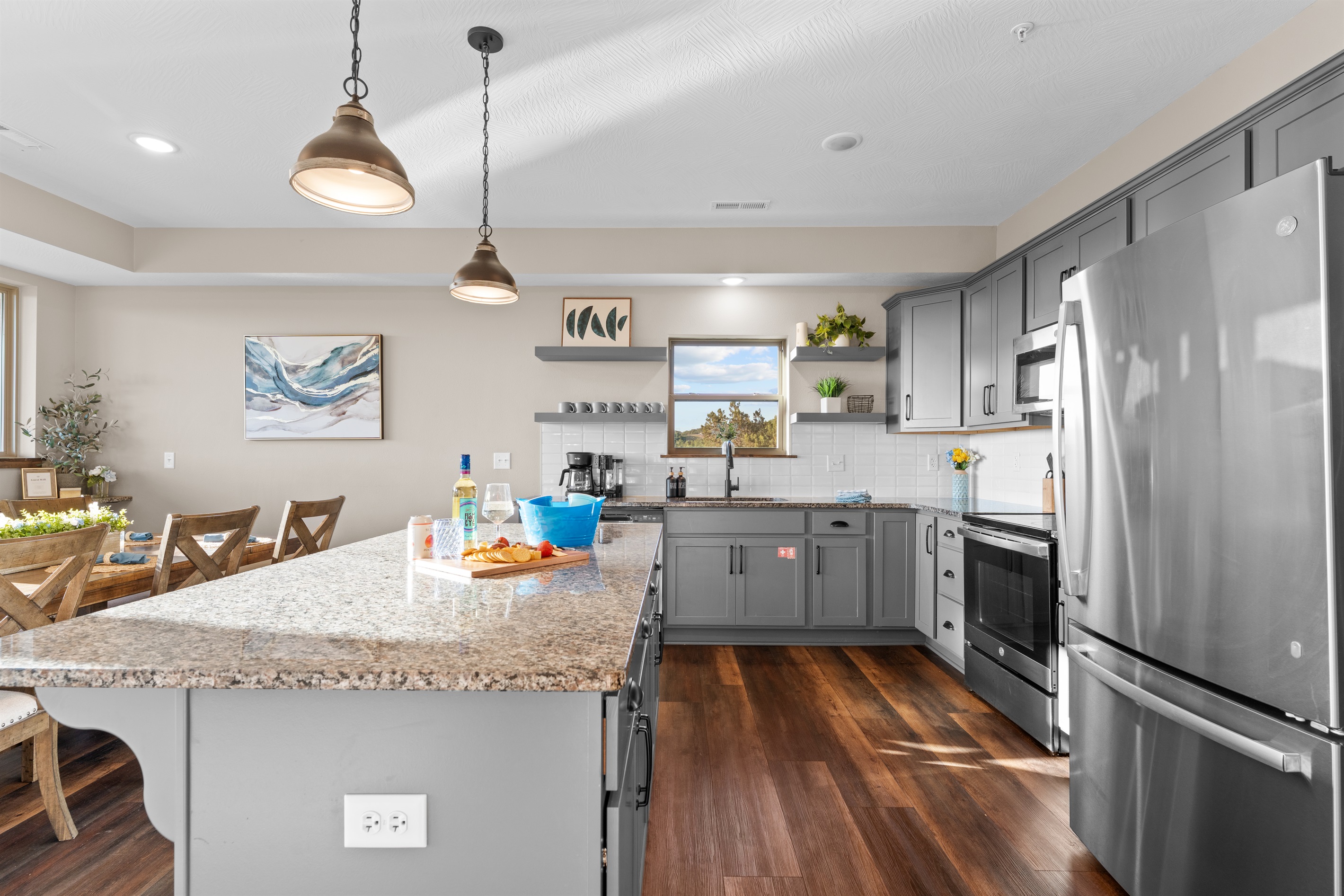 Spacious kitchen with stainless appliances and everything you need to cook for the whole crew.