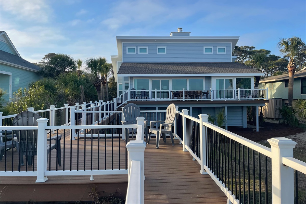 View of home from the deck of the private beach access