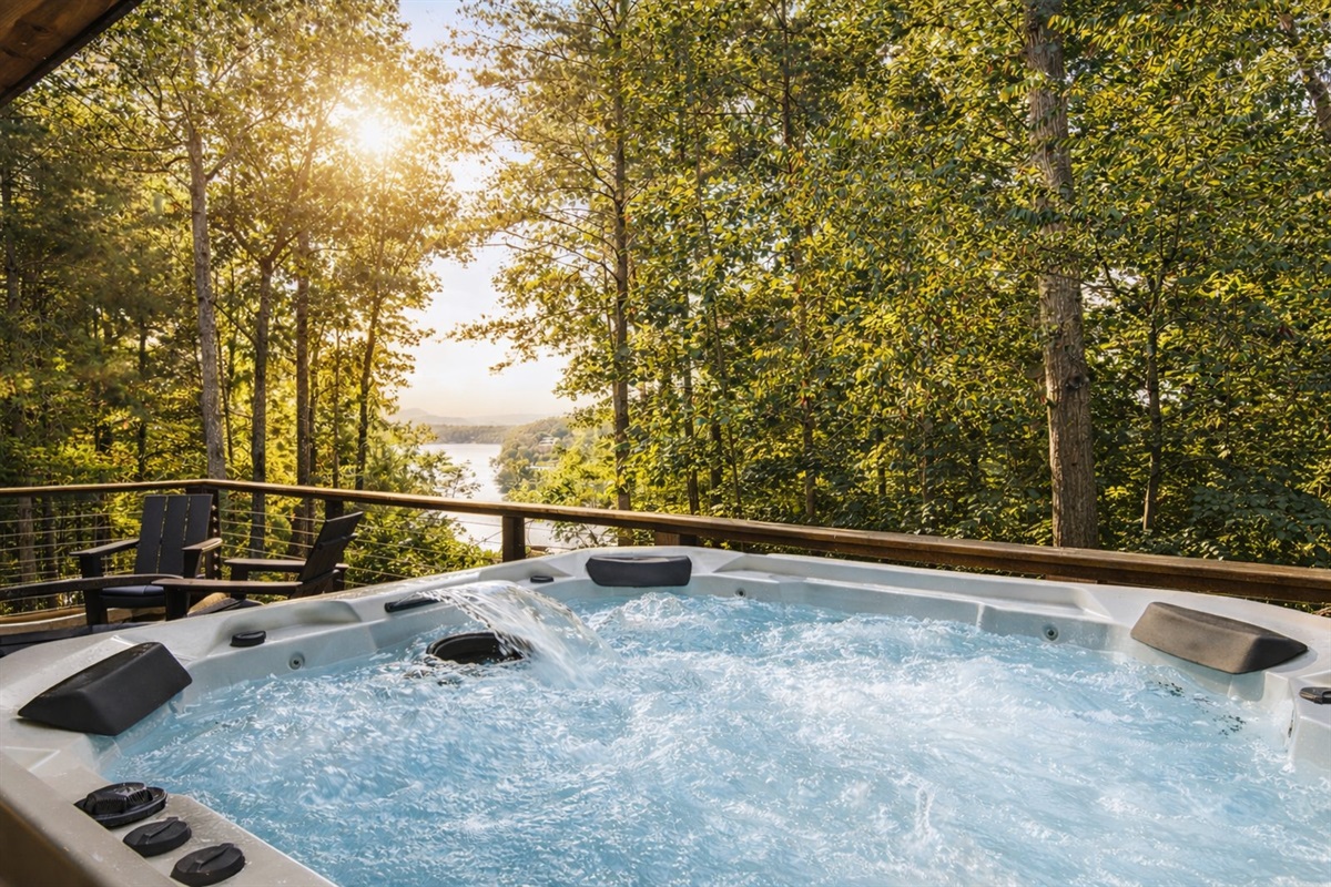A private hot tub and gas fire-pit with lake-mountain views provides the perfect space to relax and unwind.