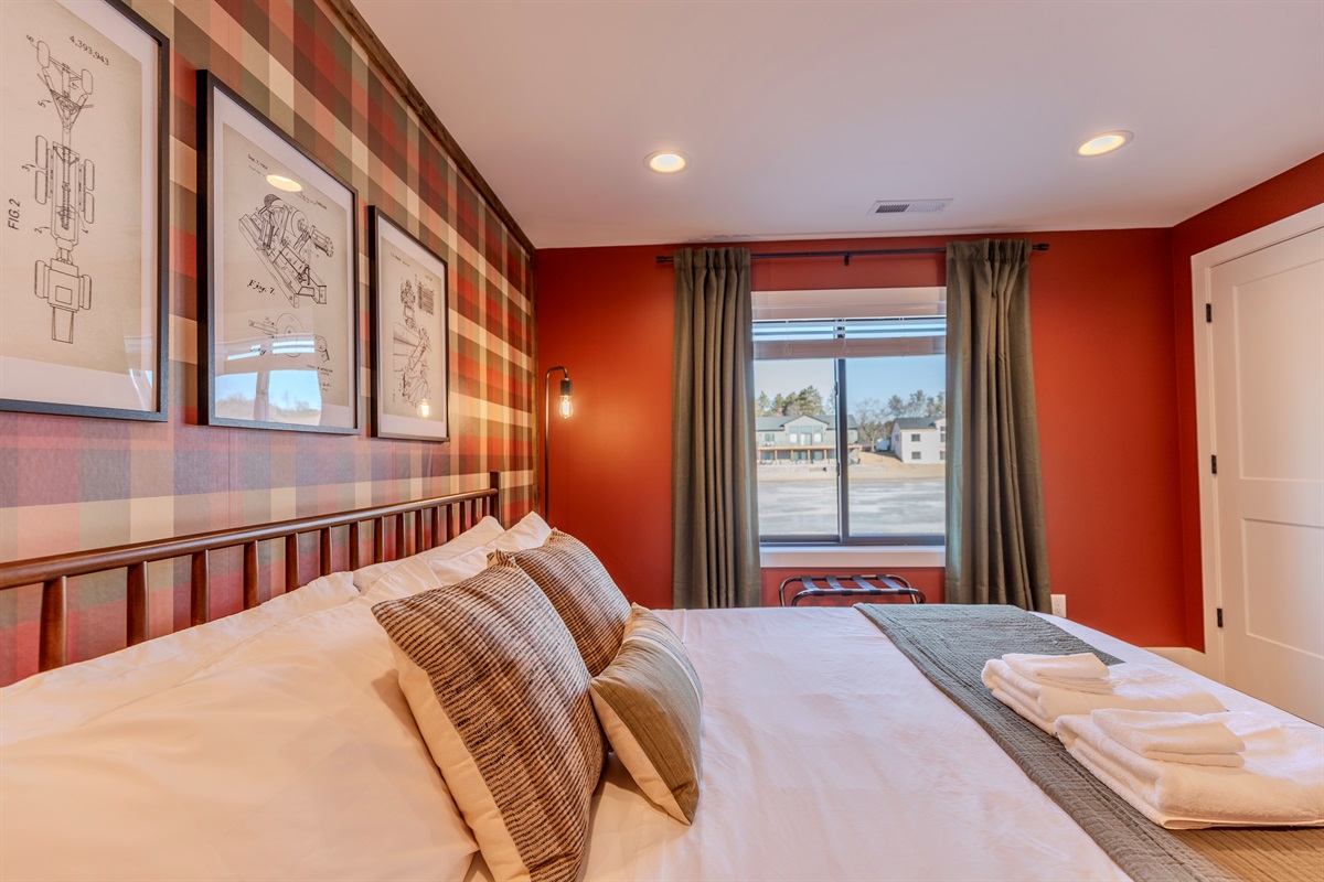 Downstairs king memory foam bedroom with Roku TV.