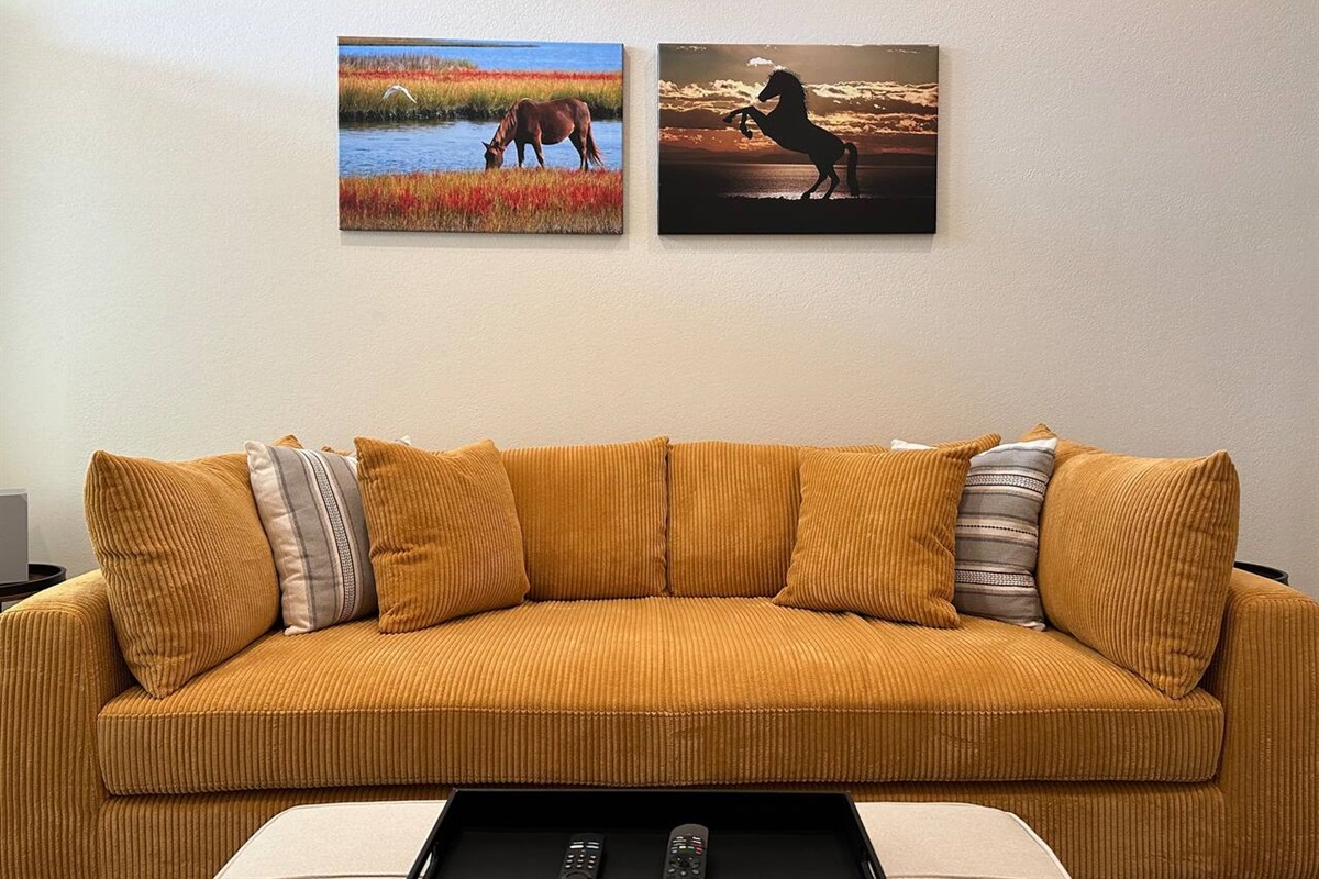 This deep couch can be used as a twin bed as well as the ottoman which folders out nicely for a small adult or child.  