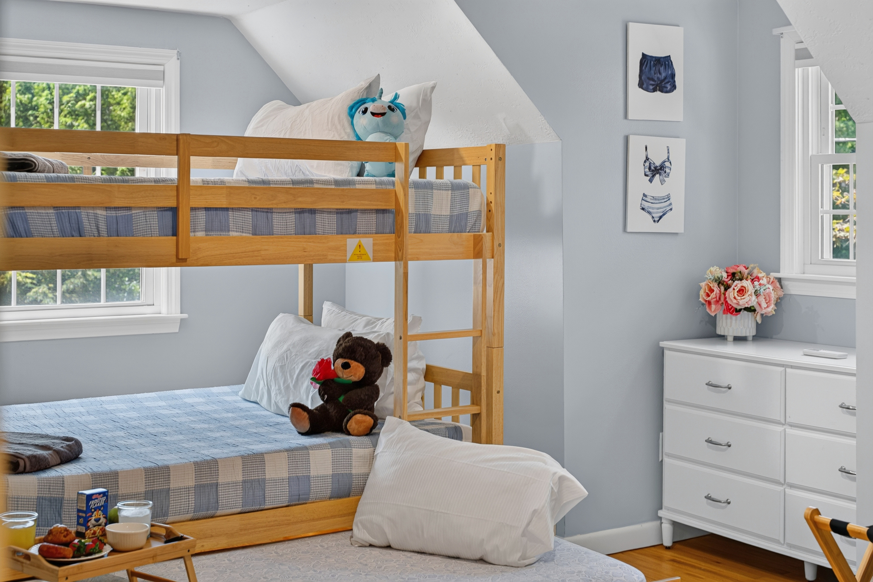 Bright, cheerful sleeping space designed for family stays.