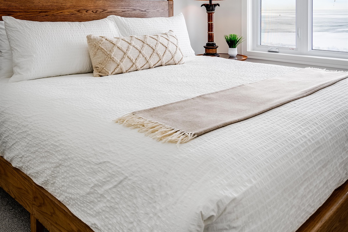 A King Bedroom with the perfect blend of modern calm and warmth.