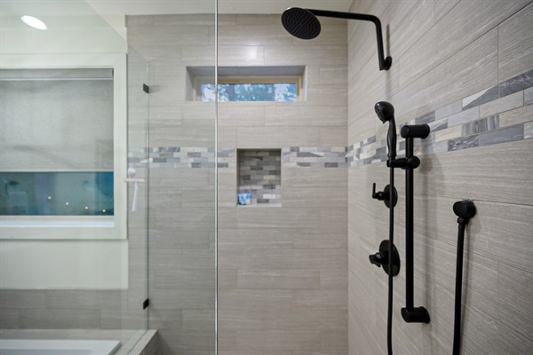 Modern spa shower with rainfall and handheld jets — sleek design, soothing tile, and the perfect finish to a day exploring Broken Bow.