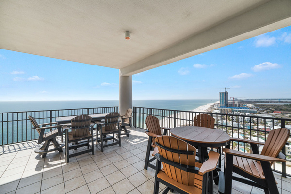 A variety of comfortable seating on a 700 sq. ft. balcony overlooking the beach!