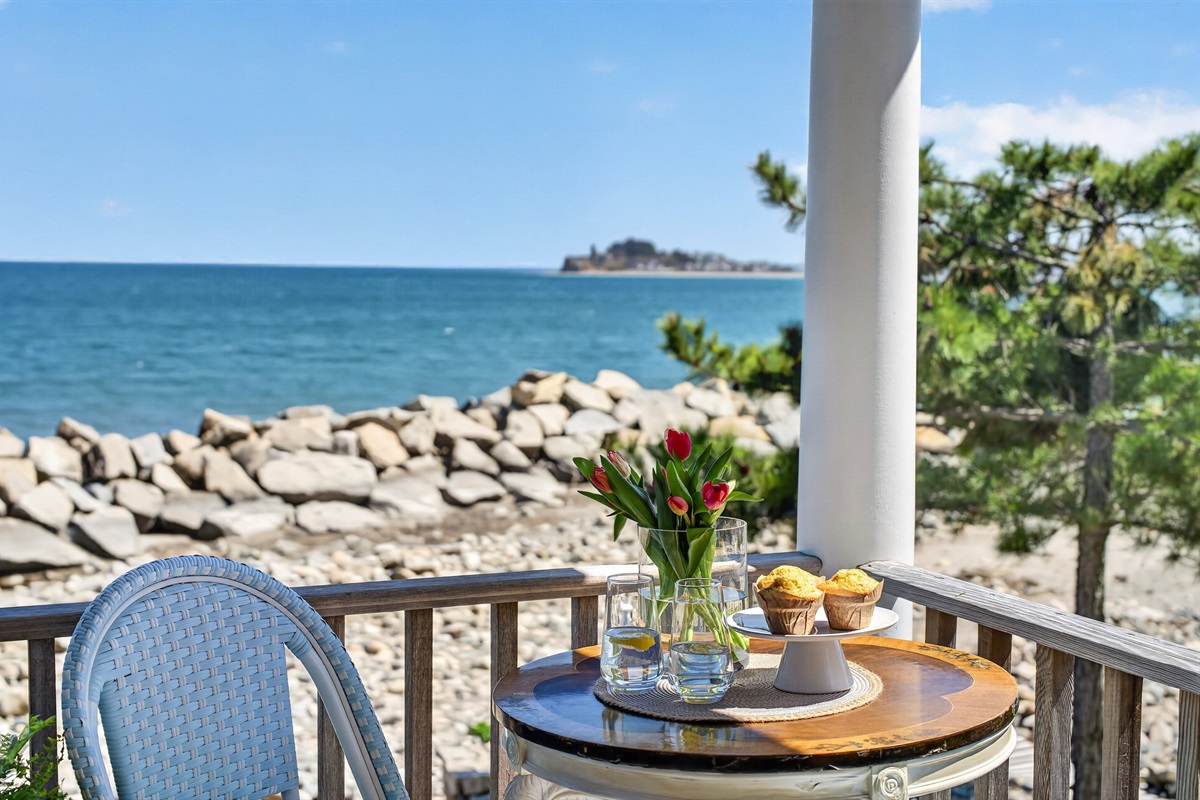 A peaceful deck overlooking the sparkling sea.