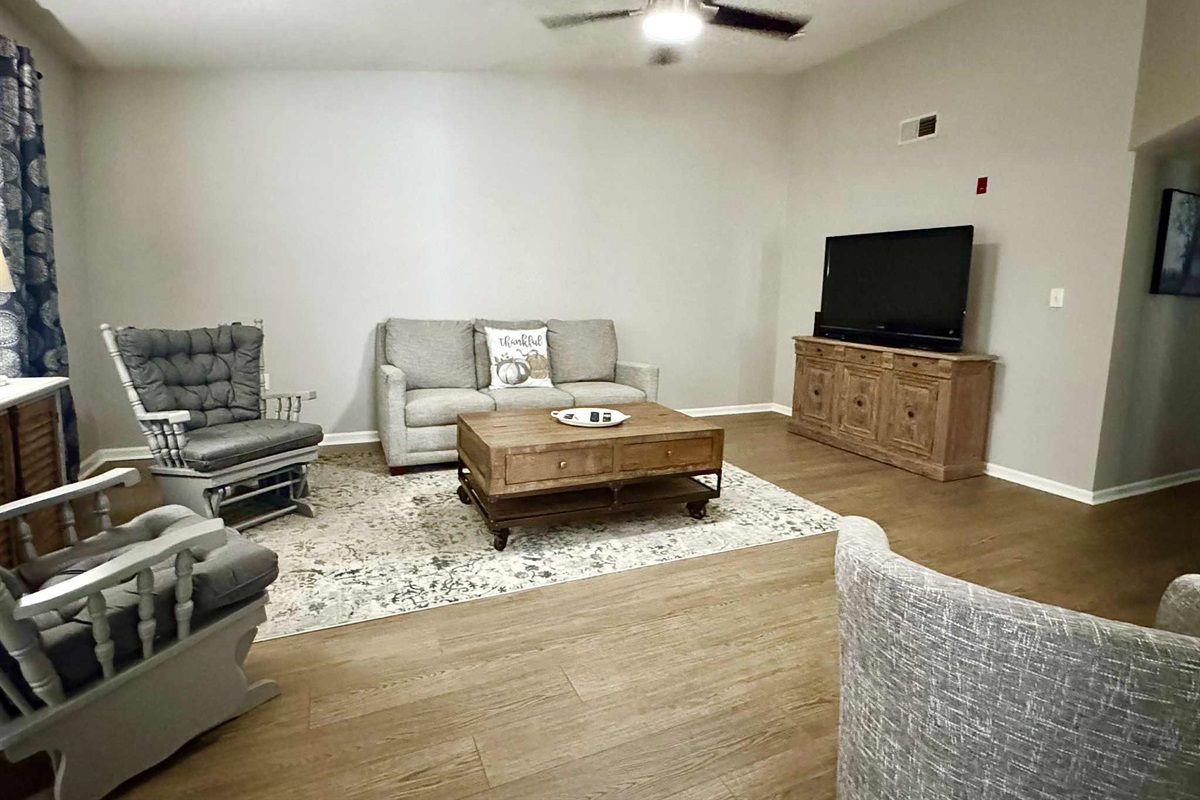 Queen Sleeper Sofa In Living room with flat screen smart tv