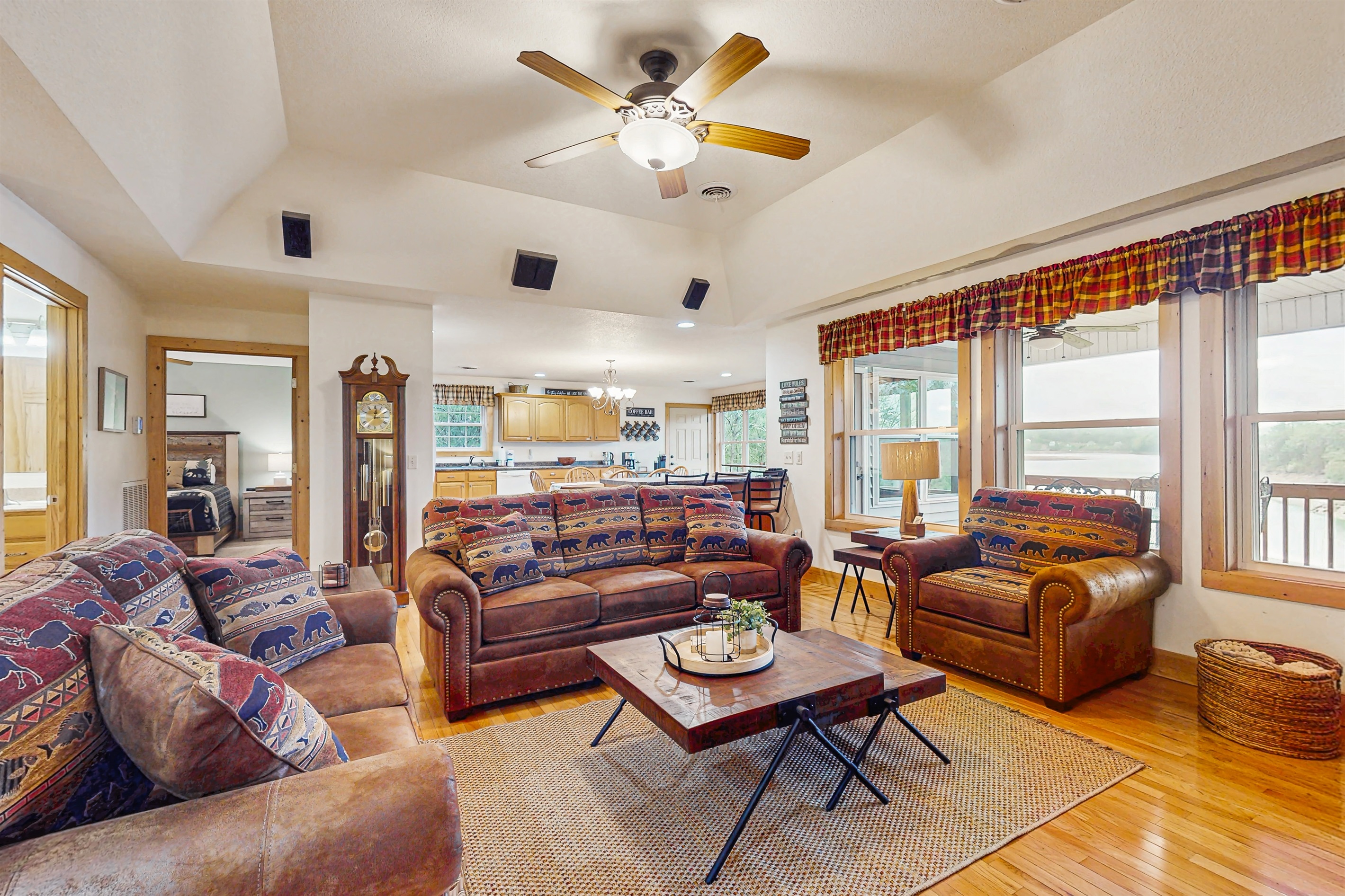 Cozy living room with seating overlooking the lake with fireplace for cozy evenings