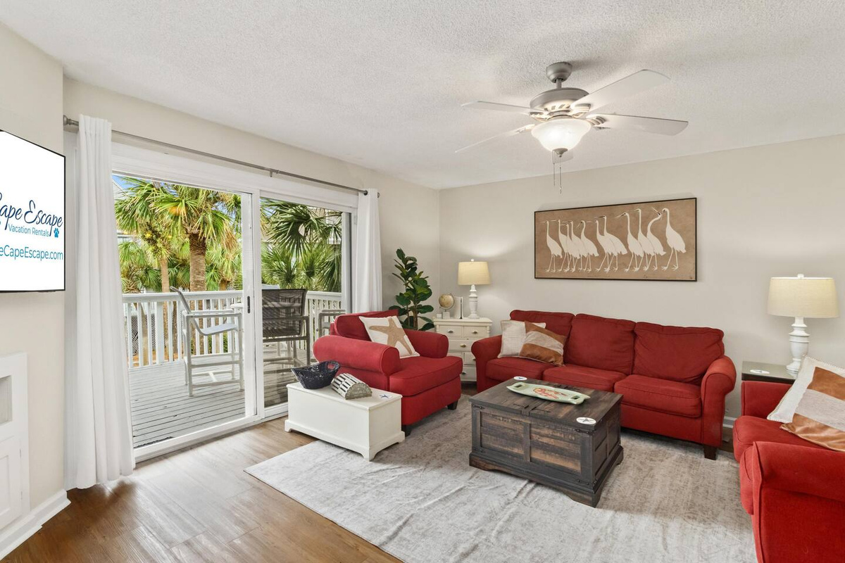 Your group's favorite spot after a beach day: sink into the couch and queue something up.
